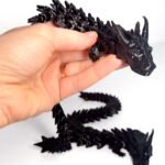 Gumijas pūķis - melns